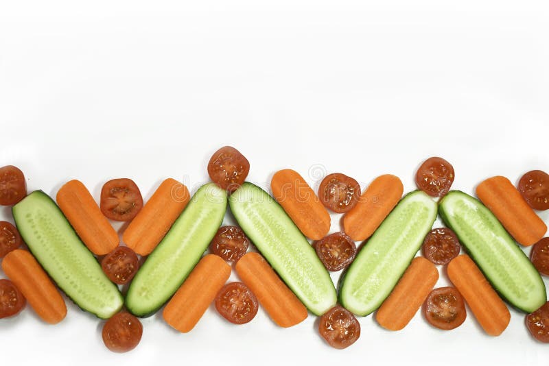 Healthy diet fresh vegetables flat lay border isolated on white. Tomato, carrot, cucumber in decorative composition. Ornament. Copy space for text horizontal stock photo