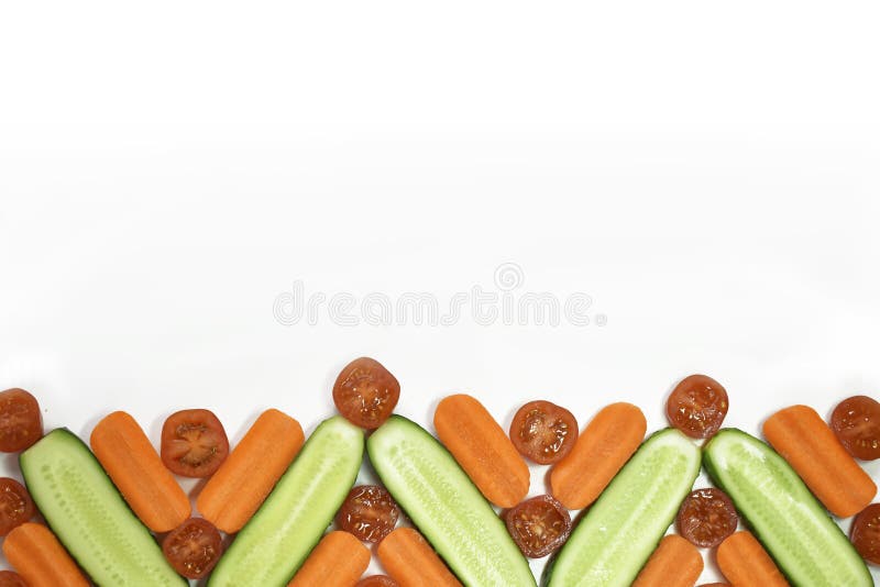 Healthy diet fresh vegetables flat lay border isolated on white. Tomato, carrot, cucumber in decorative composition. Ornament. Copy space for text horizontal stock photo