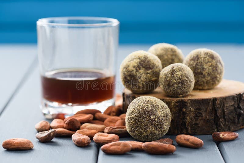 Healthy homemade chocolate sweets with raw cocoa beans and coffee. Closeup stock images