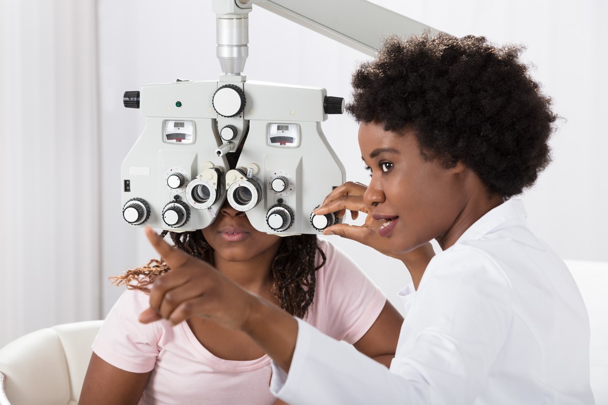 woman visiting optometrist to get contact lenses